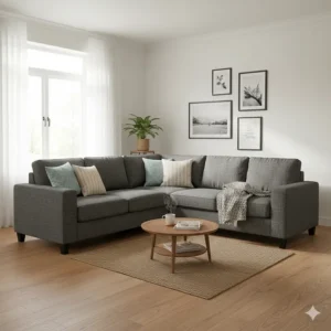 Small L-shaped corner sofa in charcoal fabric, perfect for family living rooms on a £500 budget.