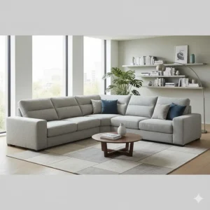 A large grey L-shaped corner sofa arranged in a modern open-plan lounge to maximise seating space.