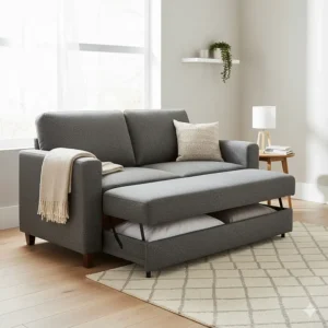 Functional charcoal grey sofa bed ideal for a guest room or home office, priced within a £1000 budget.