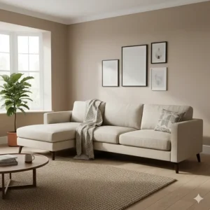 Modern left-hand facing sofa with a chaise longue in oatmeal fabric, ideal for lounging and priced under £1000.