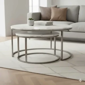 A set of two nesting marble coffee tables with slender steel frames, ideal for space-saving.