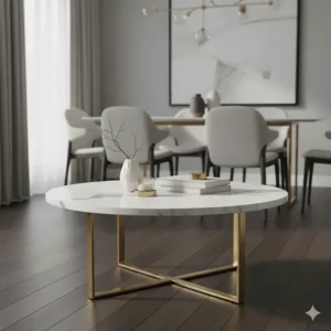 Luxurious round coffee table with a white marble top and brass legs acting as a focal point in a dining area.