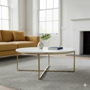Circular white marble coffee table with a brushed gold metal frame in a bright lounge.