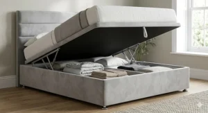 An illustration of an end-opening ottoman divan bed base showing the lift-up hydraulic mechanism.