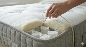Illustration demonstrating the reinforced edge-to-edge support side walls of the mattress to prevent sagging.