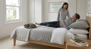 An illustration demonstrating the reinforced edge-to-edge support feature which prevents sagging when sitting on the mattress border.