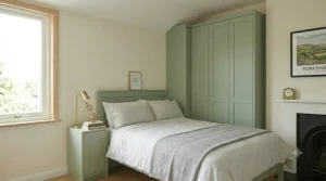 A minimalist, slimline wardrobe design integrated with a bedroom headboard, perfect for a modern, compact room.