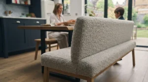 Textured bouclé and plush velvet upholstered dining benches showcasing fabric variety for interior styling.