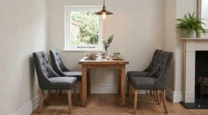 Ergonomically designed upholstered fabric dining chairs providing breathable comfort for long dinner parties.