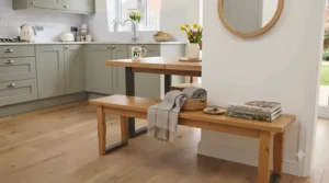 Versatile wooden bench styled in a hallway, demonstrating dual-use furniture options for affordable UK interiors.