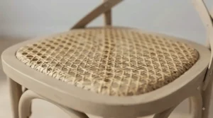 Woven rattan seat detail on a cross back dining chairs set of 2 designed for everyday dining comfort.