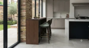 Elevated breakfast bar setup in a London apartment styled with sleek metal bar height stools.