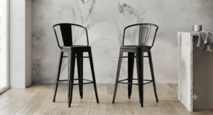 Industrial-style black metal counter stools with low backrests positioned near a breakfast bar.