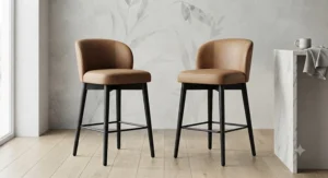 Tan faux leather breakfast bar stools with ergonomic backrests and dark metal frames.
