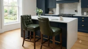 Luxurious dark green leather bar chairs with supportive high backs positioned around a raised dining counter.
