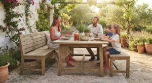 Weatherproof acacia wood best dining bench set up on a patio for outdoor dining and entertaining