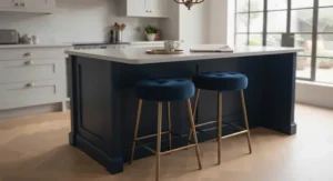 Space-saving backless bar stools stored neatly beneath a kitchen counter to maximise floor space